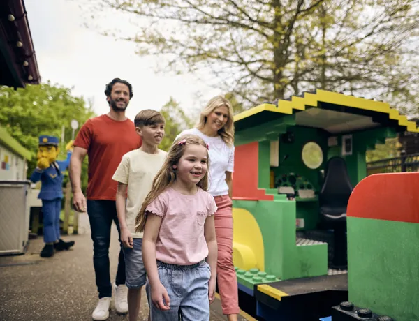 Family on platform of LEGOLAND Express train at LEGOLAND Windsor