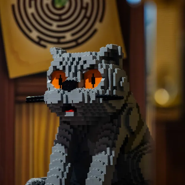 LEGO model of a cat in a Wizard room in the LEGOLAND Castle Hotel