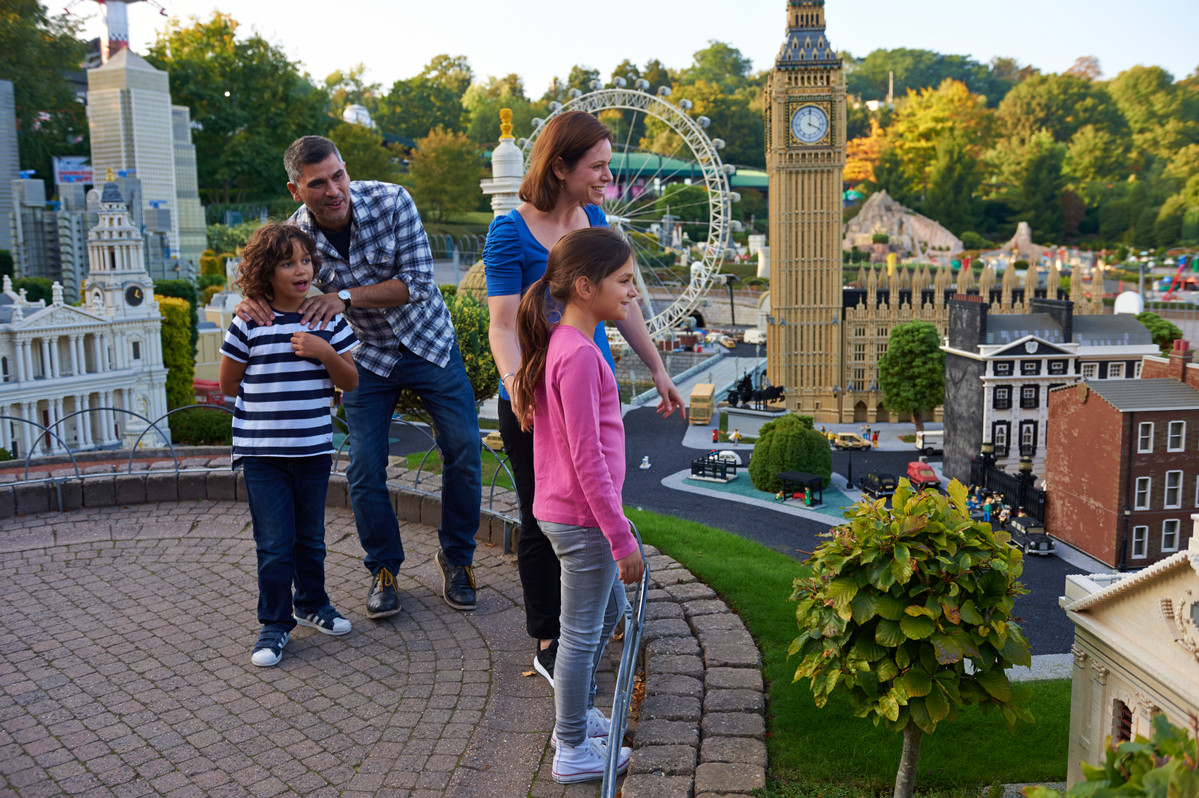 Family looking at London landmarks in Miniland at LEGOLAND® Windsor Resort