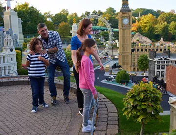 Family looking at London landmarks in Miniland at LEGOLAND® Windsor Resort