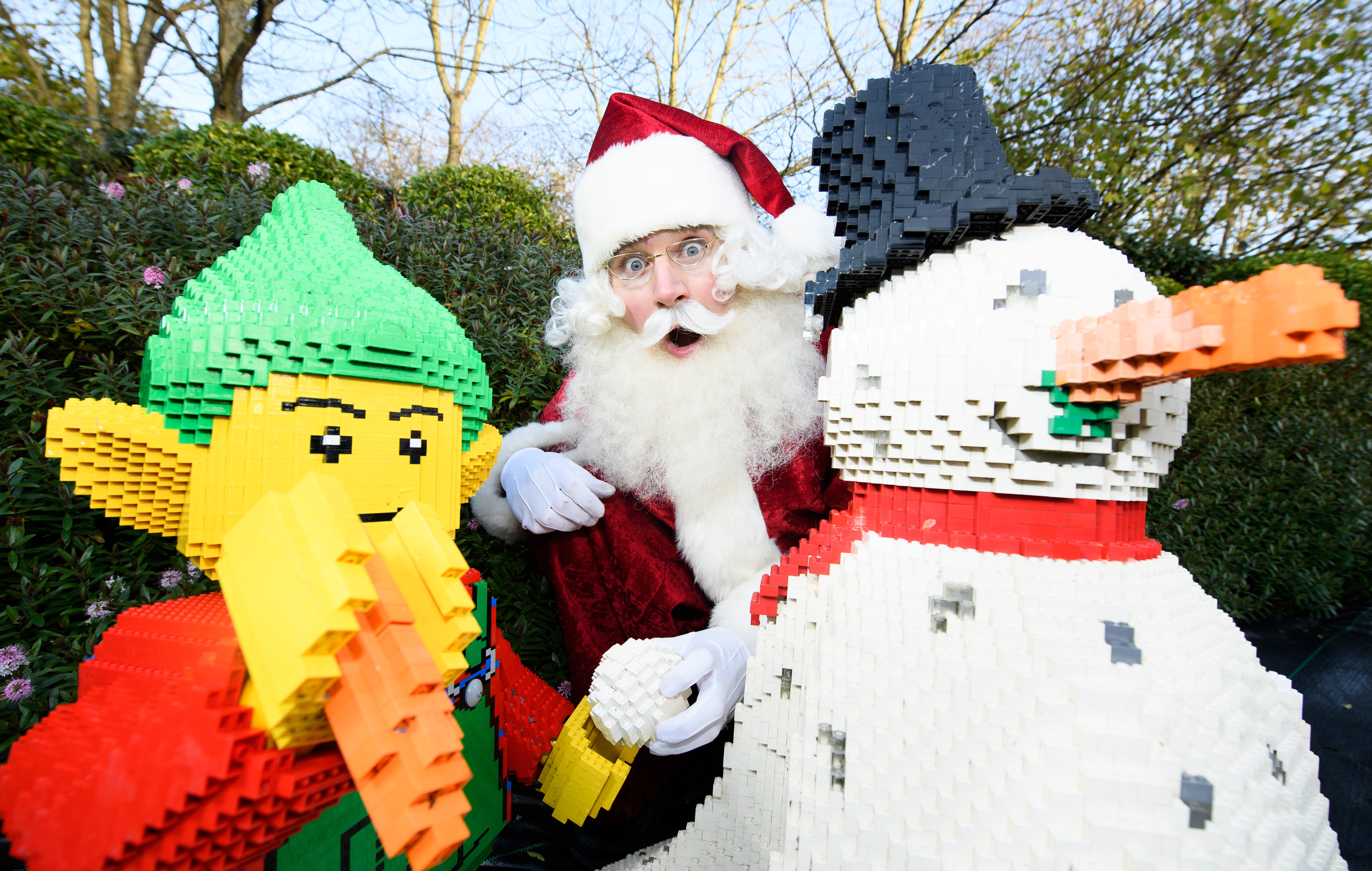 Father Christmas with LEGO models of Snowman and Elf at LEGOLAND at Christmas at the LEGOLAND Windsor Resort