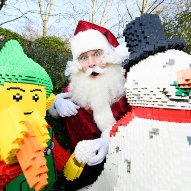 Father Christmas with LEGO models of Snowman and Elf at LEGOLAND at Christmas at the LEGOLAND Windsor Resort