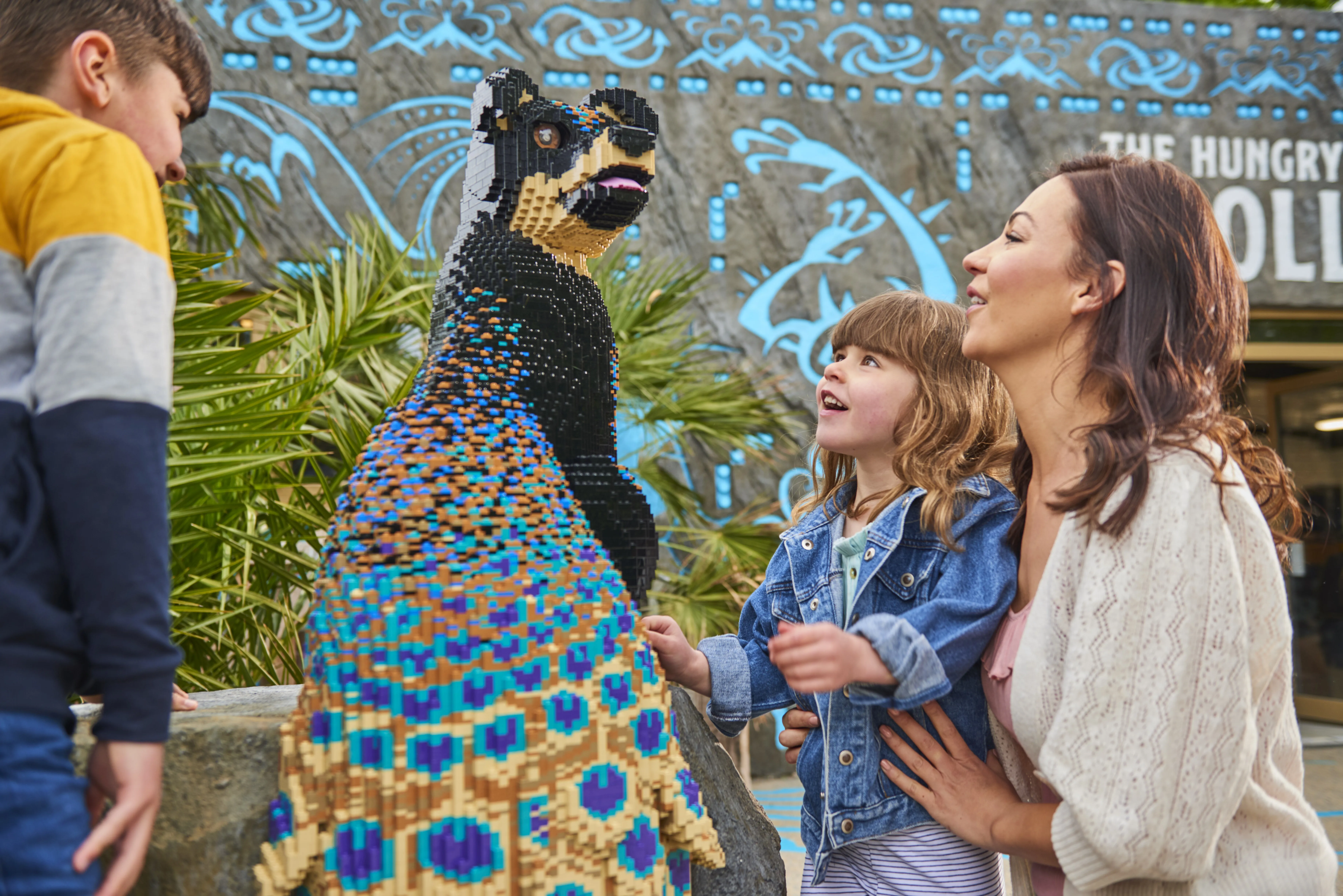 Family looking at Peadog in LEGO® MYTHICA at the LEGOLAND® Windsor Resort