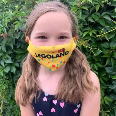 Girl wearing LEGOLAND face mask