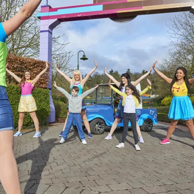 Kids learning dance moves with the LEGO Friends in Heartlake City