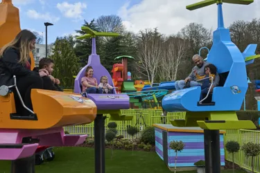 Families laughing and smiling on DUPLO Valley Airport