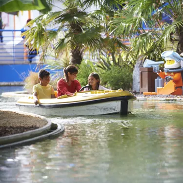 Family in boat at Coastguard HQ at the LEGOLAND Windsor Resort