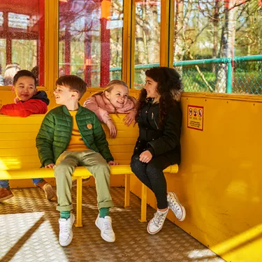 Children laughing and talking on the Hill Train