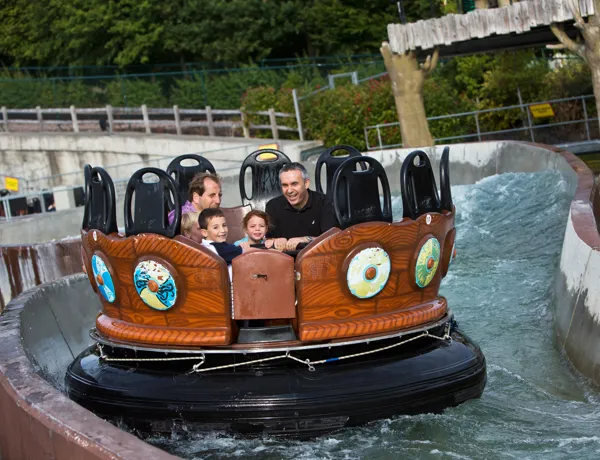 Families getting wet on Viking River Splash rapids ride