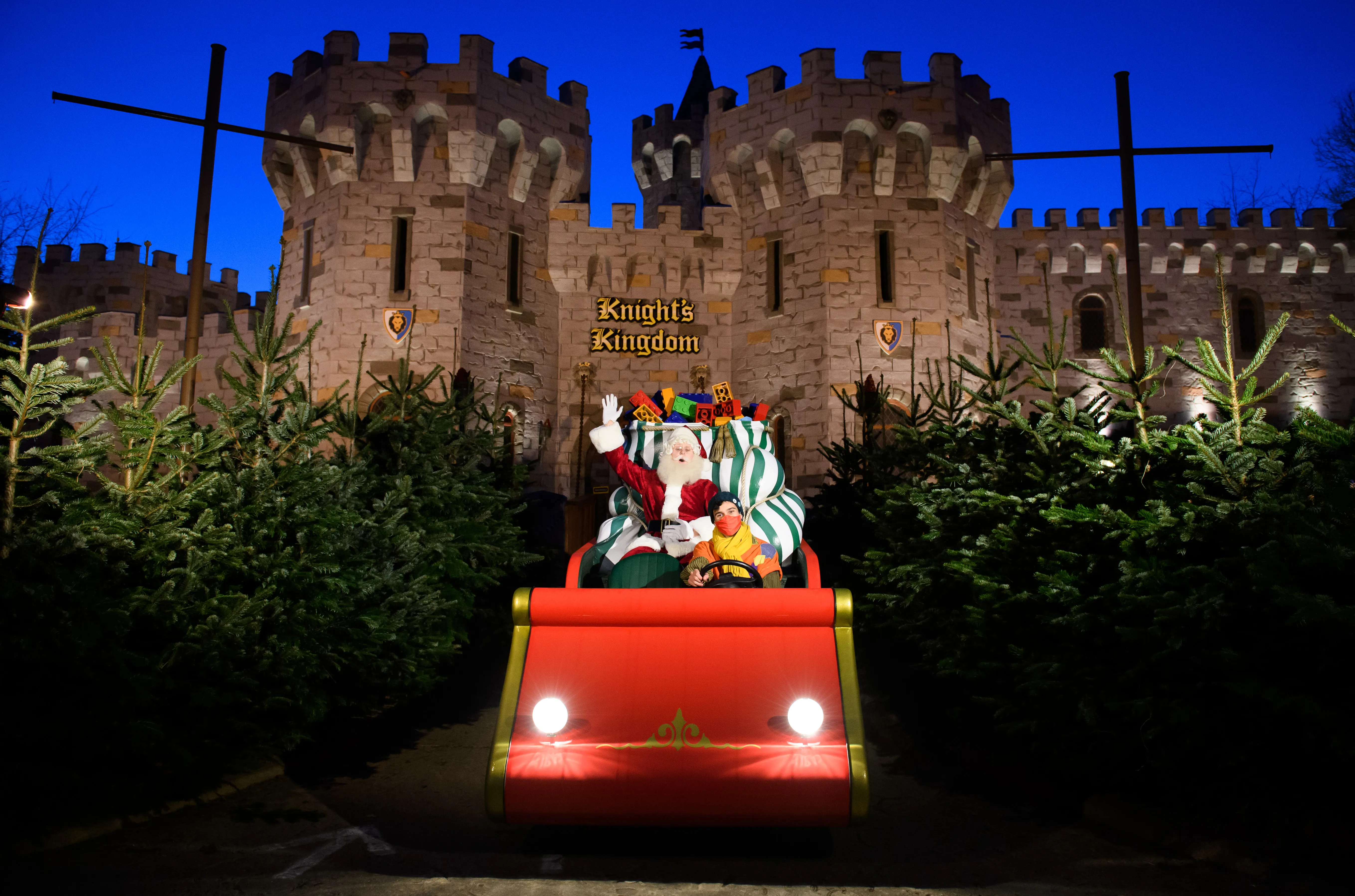 Father Christmas and Elf on Sleigh around LEGOLAND Windsor Resort