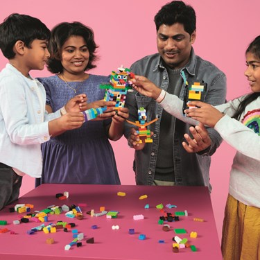Family playing with LEGO® - Rebuild the World at PLANET LEGOLAND®