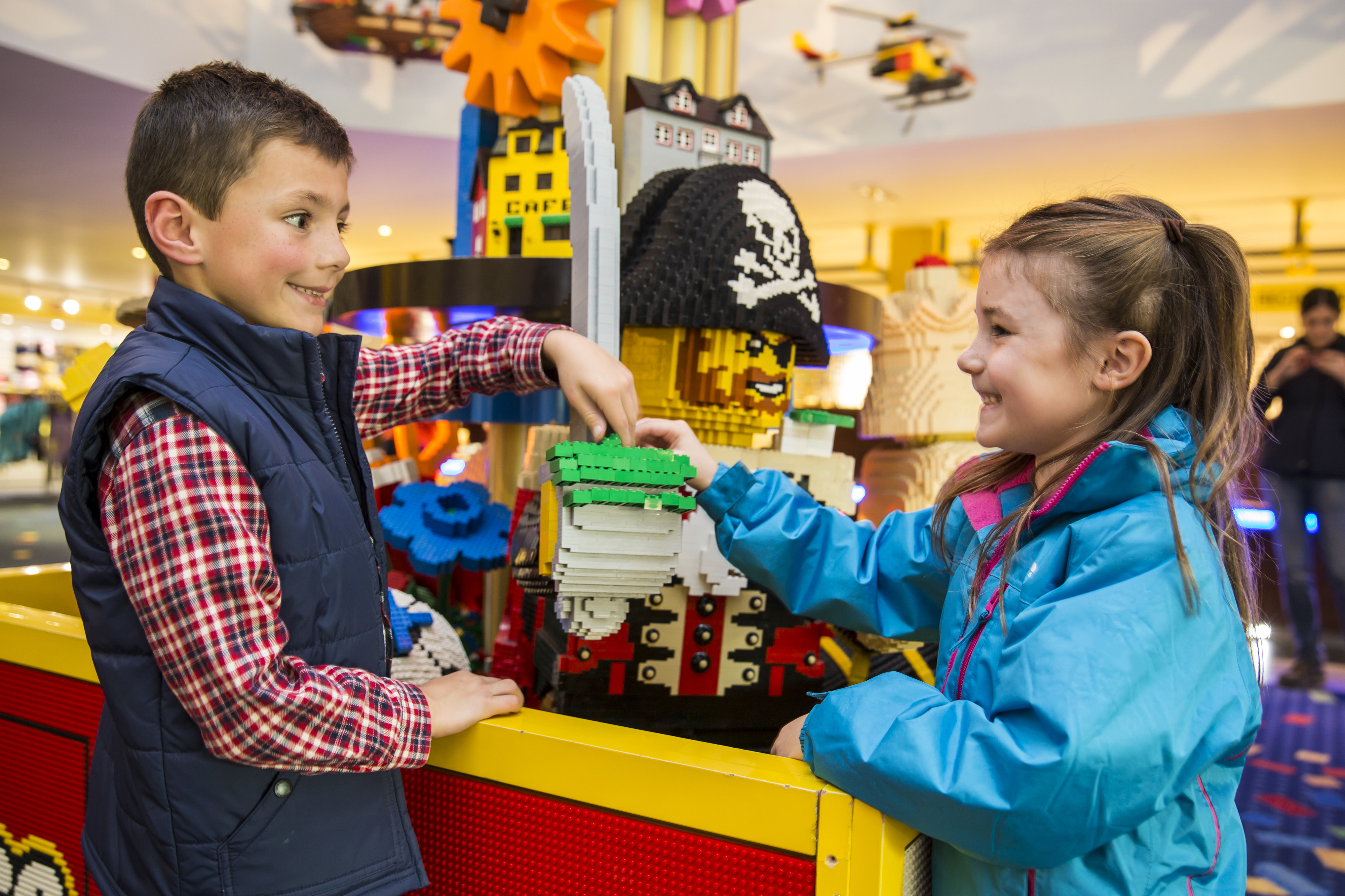 Children interacting with LEGO models in the Reception of the LEGOLAND Resort Hotel