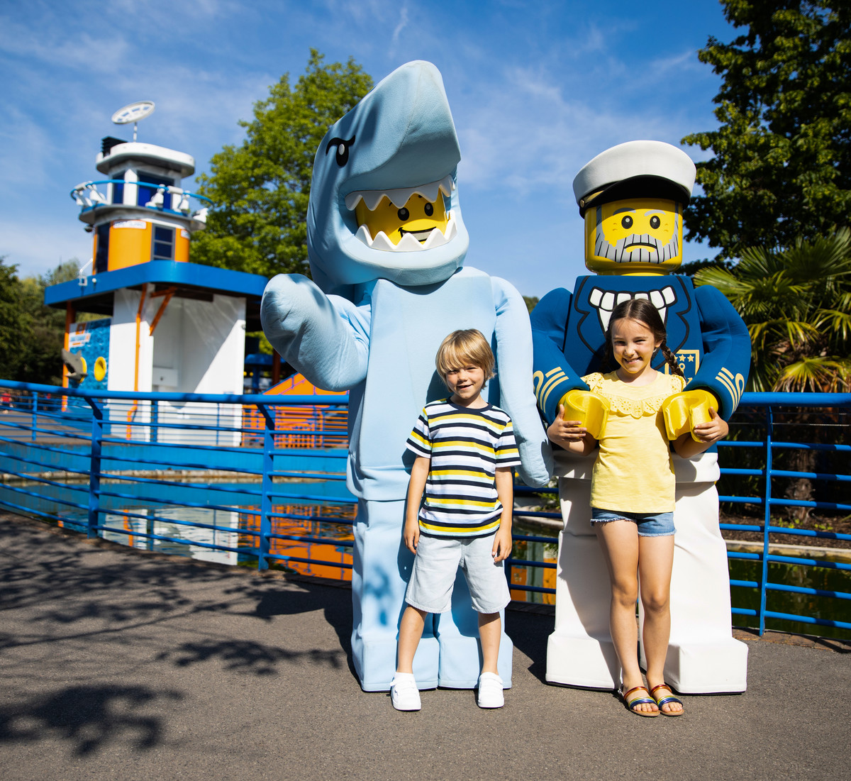 Boy and girl with Shark Guy and Sea Captain