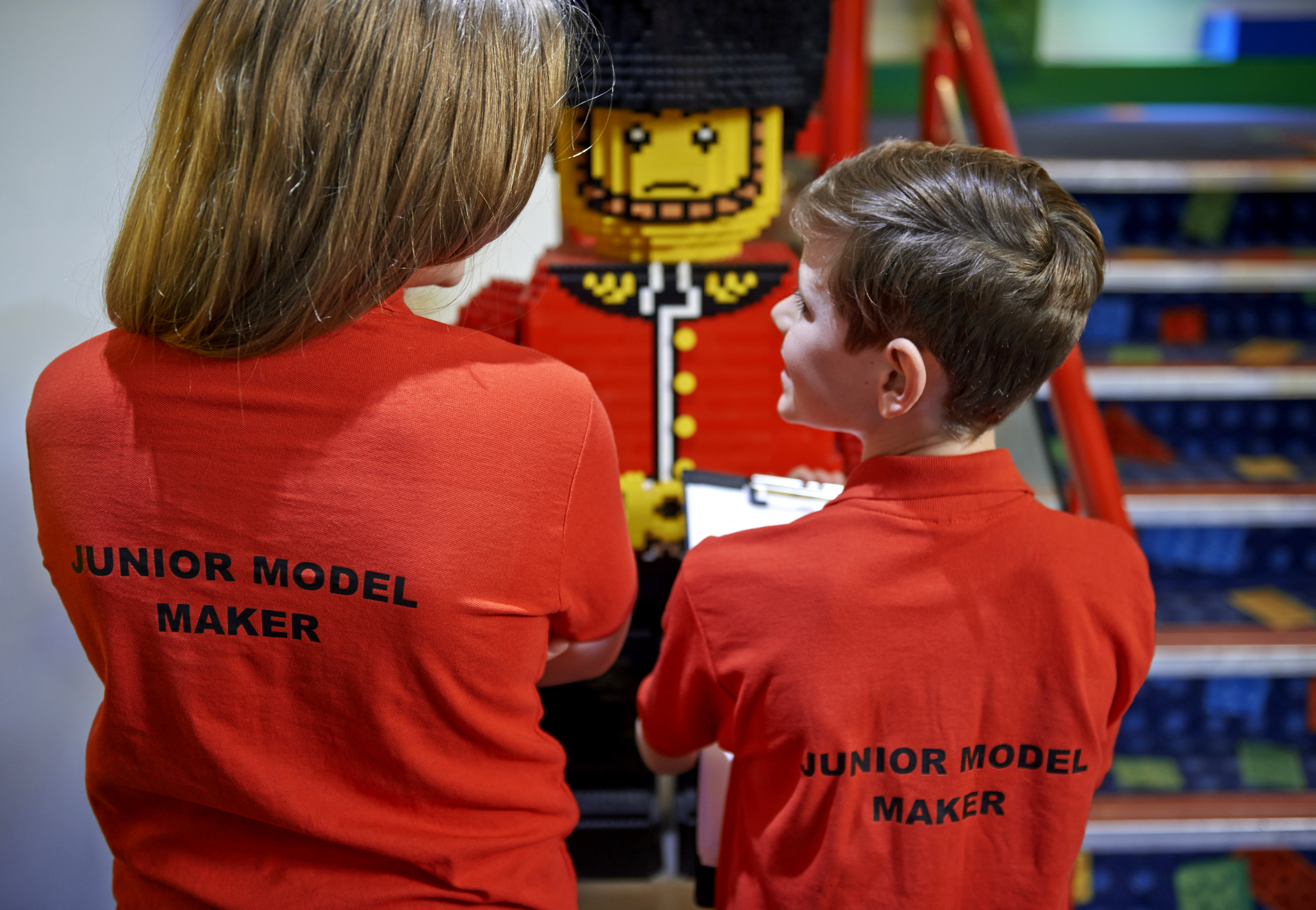 Children checking LEGO models in Junior Model Maker Experience