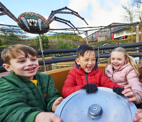 Children laughing and smiling on Spinning Spider at the LEGOLAND Windsor Resort