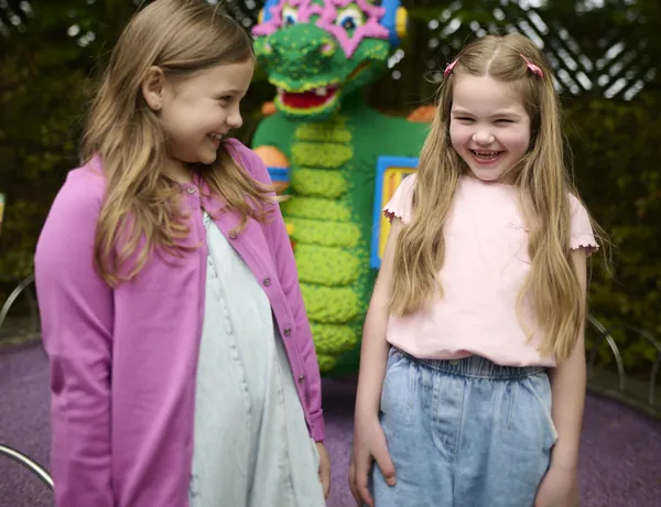 Girls with Party Ollie the Dragon LEGO model at LEGOLAND Windsor