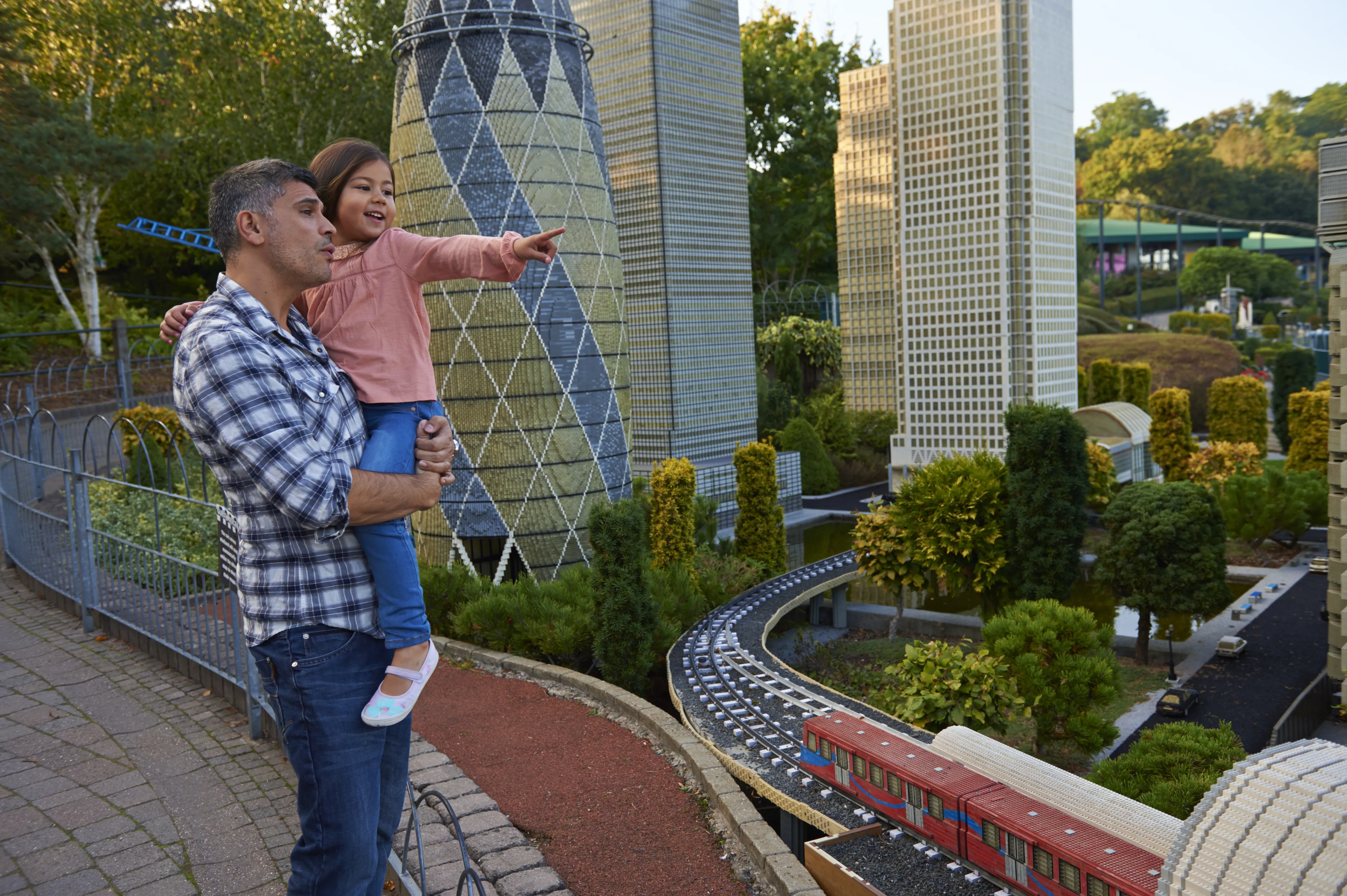 Father and girl pointing at London landmarks in Miniland at the LEGOLAND Windsor Resort