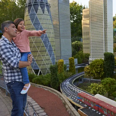 Father and girl pointing at London landmarks in Miniland at the LEGOLAND Windsor Resort