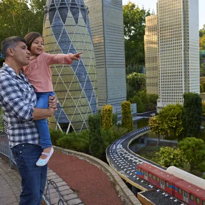 Father and girl pointing at London landmarks in Miniland at the LEGOLAND Windsor Resort