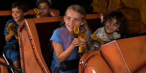 Children holding laser blasters in Laser Raiders at the LEGOLAND Windsor Resort