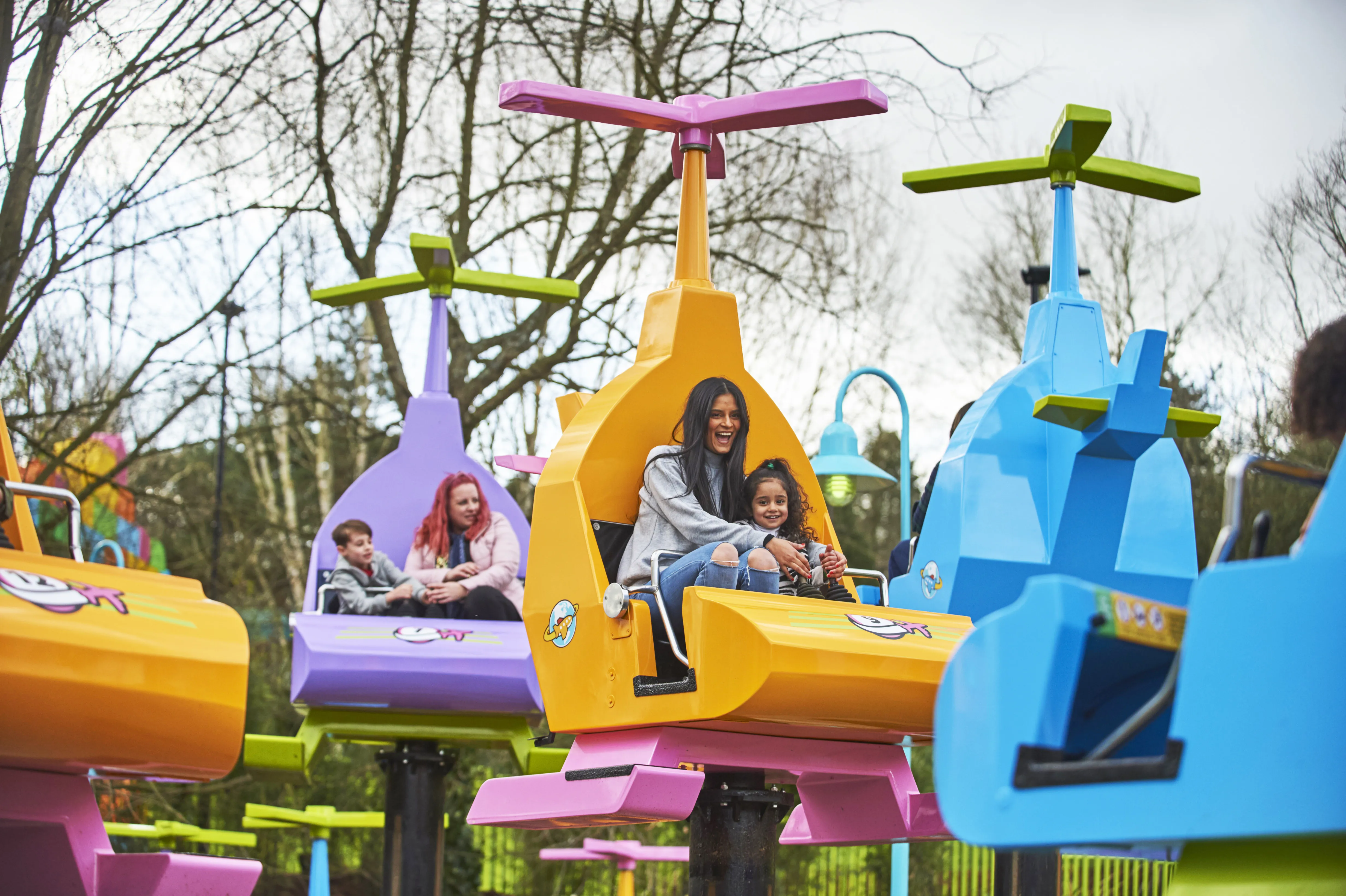 Mother and girl laughing on DUPLO Valley Airport