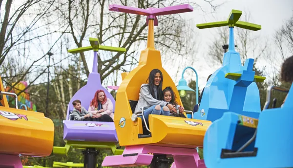 Mother and girl laughing on DUPLO Valley Airport