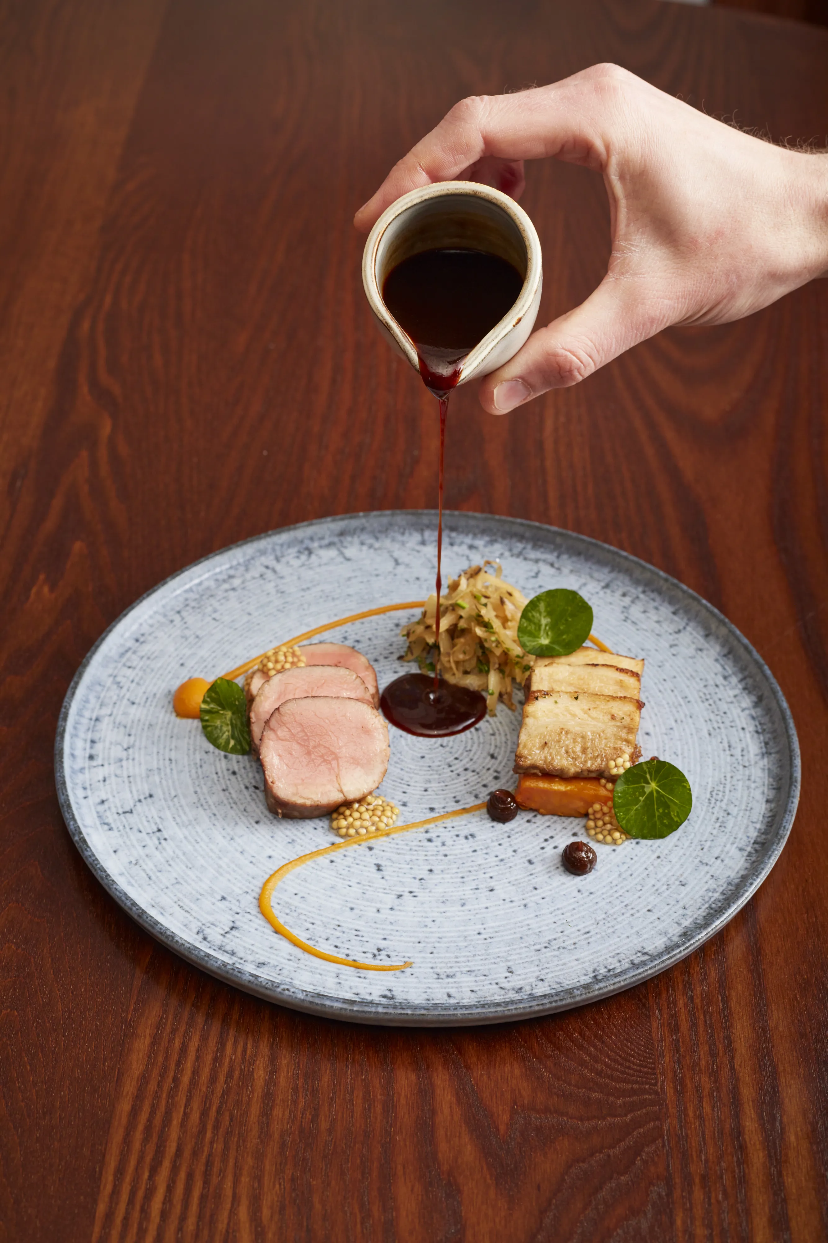 Slow Cooked Pork Fillet - Braised Cabbage, Crispy Pork Belly, Sweet Potato, Mustard, Prune Ketchup